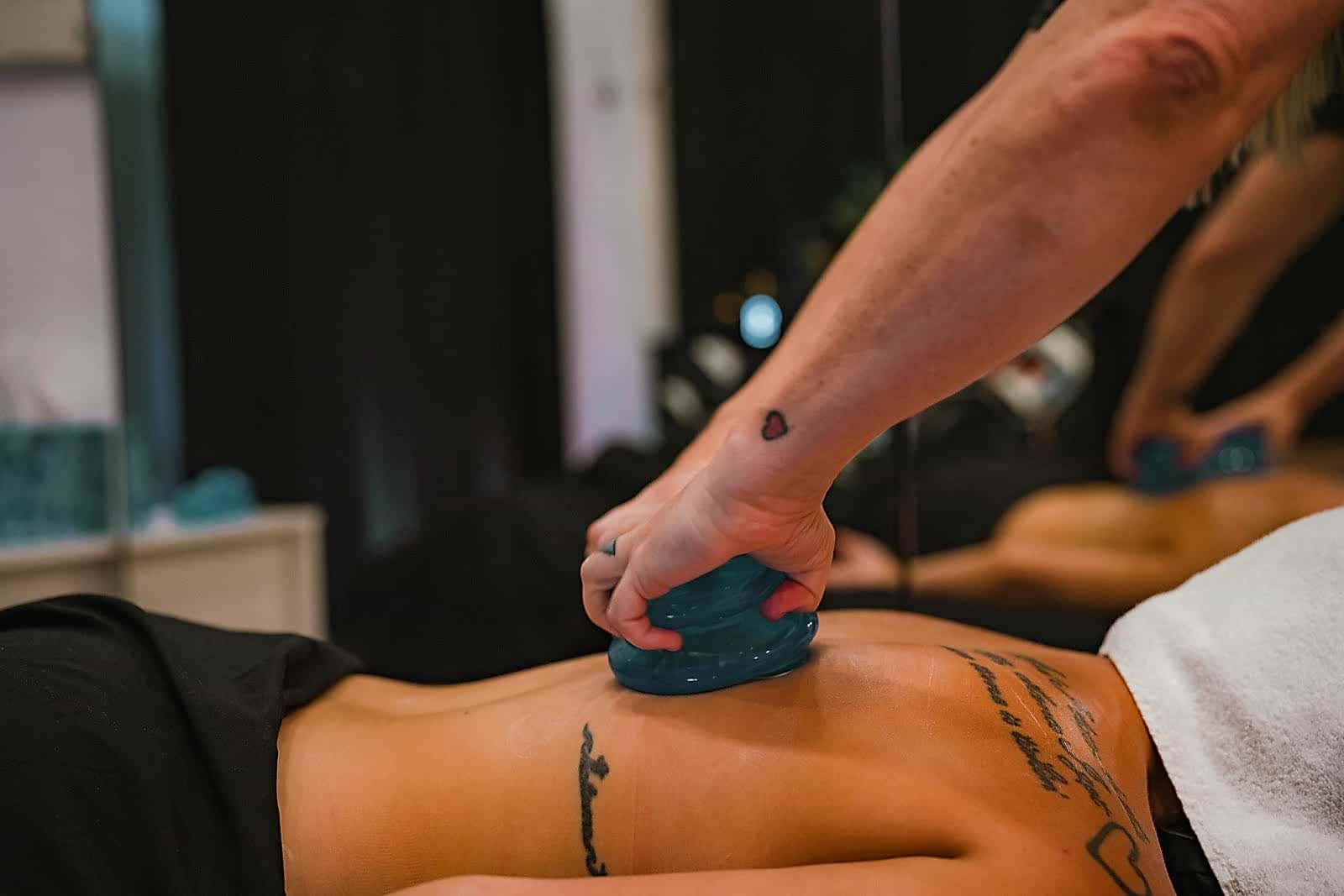Cupping therapy on a client's back at Flex Fitness